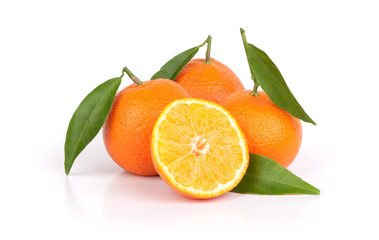 Ripe tangerines with leaves and slice