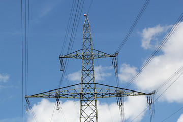 Electrical pylon in a cloudy sky