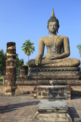 Buddha Statue in Sukhothai Historical park at sunset, Thailand,