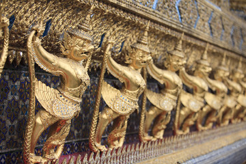 Fototapeta premium Garuda on wall in Wat Phra Kaew Grand Palace of Thailand.