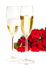 Valentine's day roses and champagne wine isolated on white