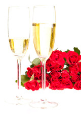 Valentine's day roses and champagne wine isolated on white