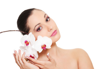 woman with orchid over white background