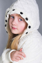 Obraz premium little girl wearing warm winter coat