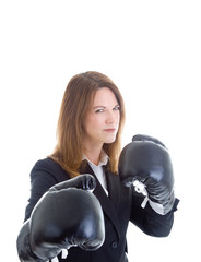 Angry White Businesswoman Wearing Boxing Glove Glaring Isolated