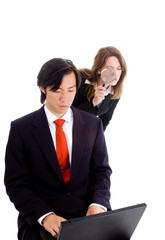 Woman Shoulder Surfing Asian Man Magnifying Glass Isolated White - 28937641