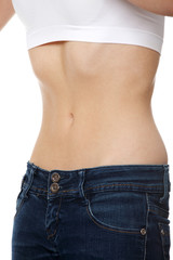 Belly of beautiful young female with anorexia