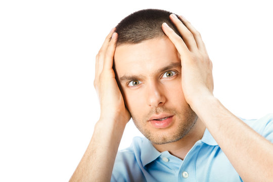 Puzzled man, isolated on white background