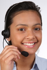 Headshot of beautiful girl on customer support