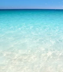 Gordijnen Caribische turquoise zee strand kust wit zand © lunamarina