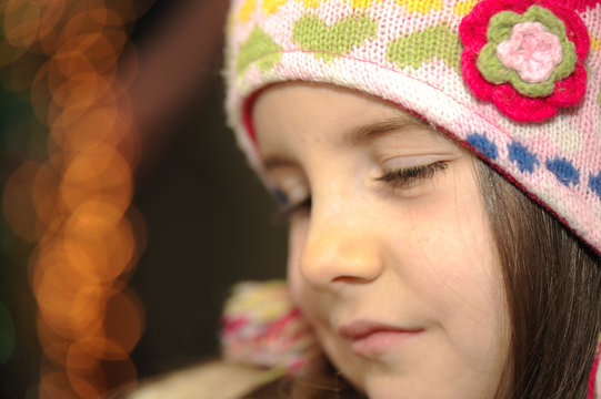 Portrait of smiling little girl in funny hat