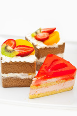 pieces of cake against white background