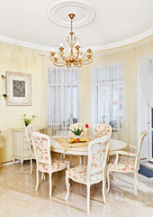 Classic style dining room interior in beige pastoral colors