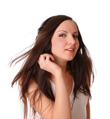 Fototapeta premium teenage girl listening music on headphones