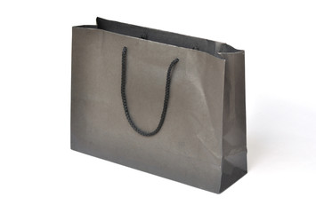 Black crumpled shopping paper bag