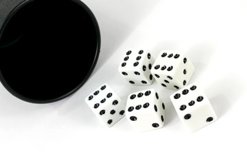 Five dice with cup