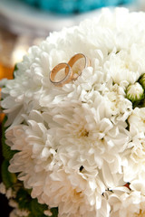 bridal rings on flowers