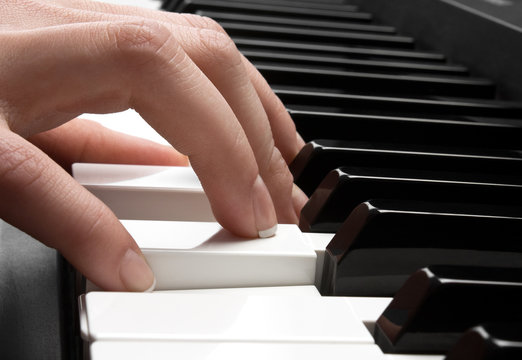 piano and hand