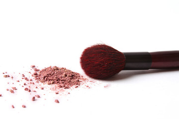 makeup brush and cosmetic powder