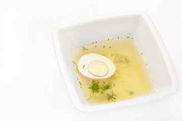 Chicken broth with dill and egg