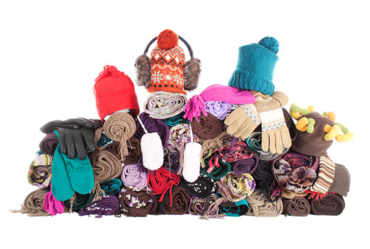 Heap Of Winter Scarfs, Hats And Gloves | Isolated