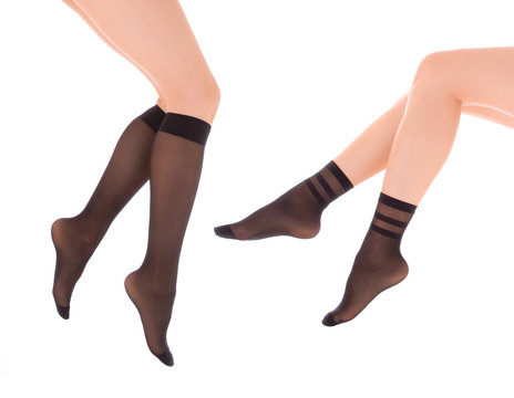 Elegant female legs in socks