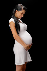 pregnant on black background