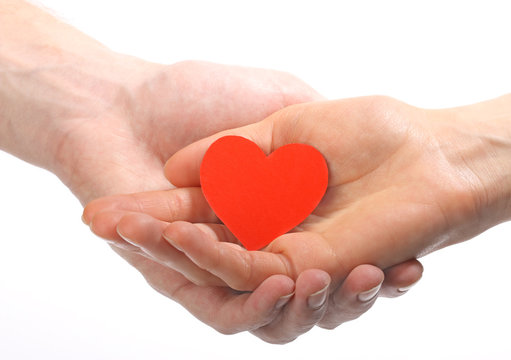 Valentine's heart in human hands