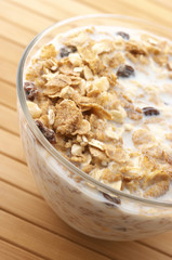 Muesli with milk close-up