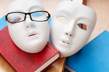 Reading concept with masks, books and  glasses