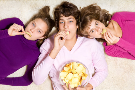 Friends Eating  Crisps