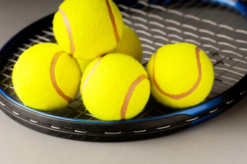Tennis concept with balls and racket