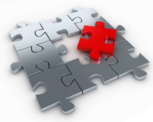 Fototapeta premium Puzzle pieces, with a red piece free