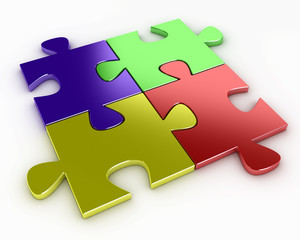 Four puzzle pieces of various colors
