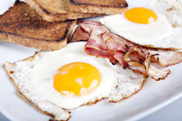 Breakfast - toasts, eggs, bacon