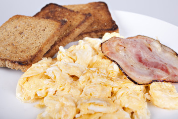 Breakfast - toasts, eggs, bacon