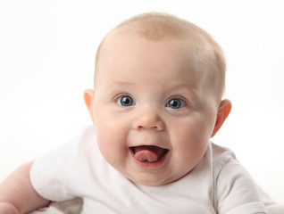 Cute baby sticking tongue out