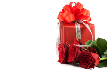 red present box and three roses
