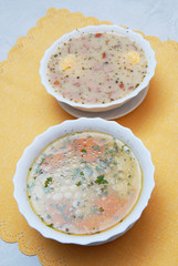 broth , chicken soup with noodles and polish sour rye soup