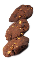 three homemade chocolate cookies with peanuts