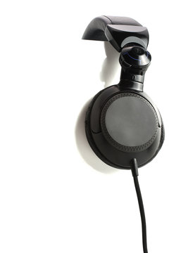 dj headphones on whithe sheet
