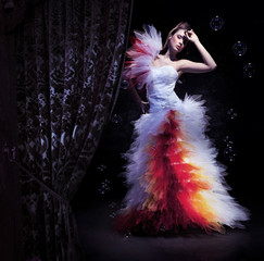 Beauty woman wearing gorgeous dress