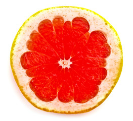 Close up of sliced pink grapefruit isolated on white