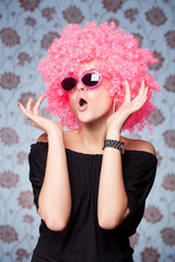 Funny girl in pink wig