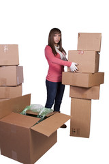 young girl packing up and moving - isolated