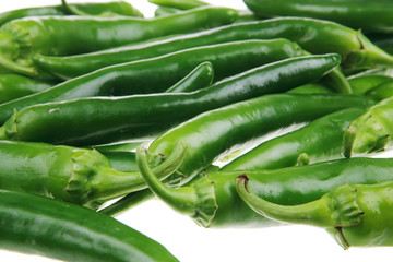 pile of spicy green hot chili peppers