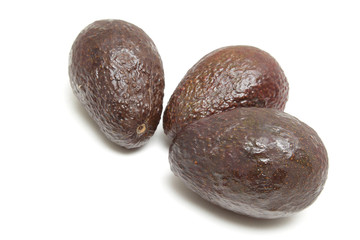 Three avocados isolated