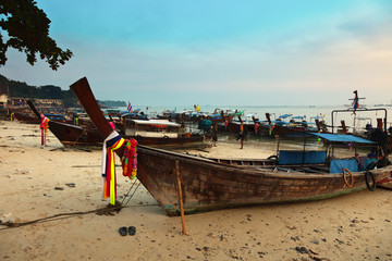 Longboats at sunset on Phi Phi island, Thailand