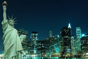 Manhattan Skyline and The Statue of Liberty at Night Lights © Joshua Haviv