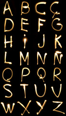 light yellow letters on a black background